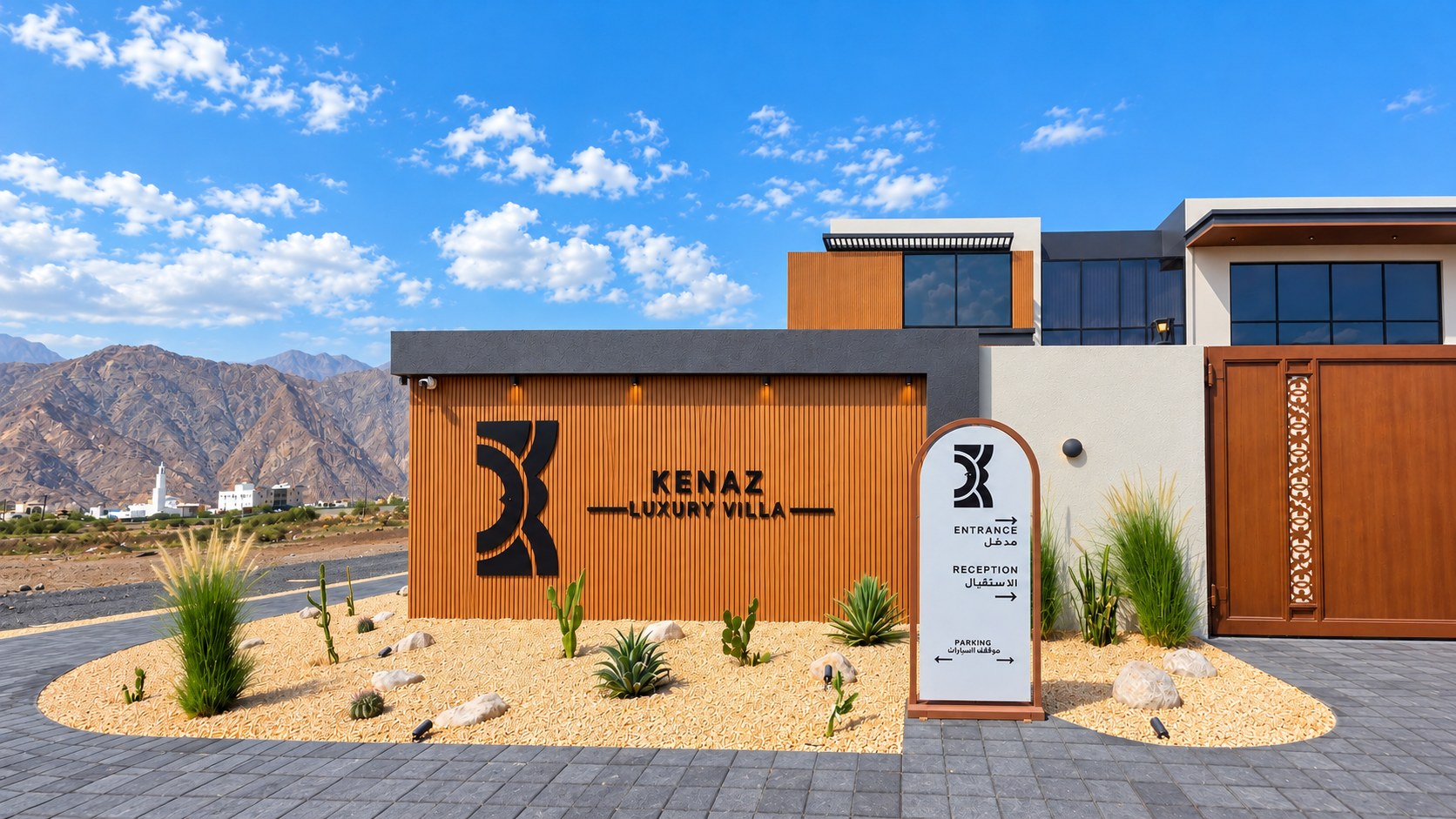 Kenaz branded entrance in honey-coloured timber with mountains behind
