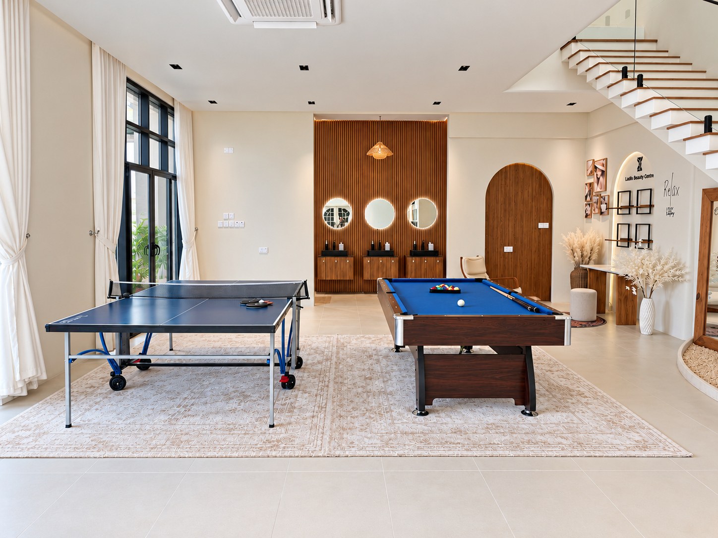 Billiards and table tennis in Kenaz’s shared games area